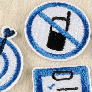 Decorative blue and white embroidered iron-on patches for clothing, hats and bags