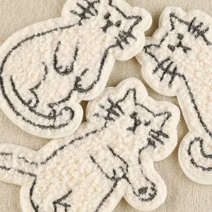 Cute beige cat towel embroidery patches with self-adhesive backing for DIY crafts