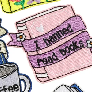 Cartoon book embroidered patch with 'I banned read books' text for clothing decoration