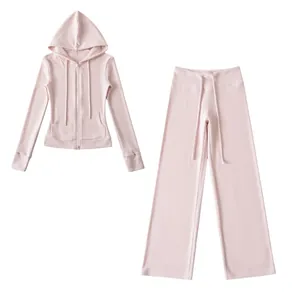 Pink two-piece dralon tracksuit set featuring a zip-up hoodie and wide-leg pants