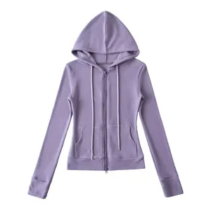 Detail view of a purple zip-up hoodie with soft thermal fabric and adjustable hood