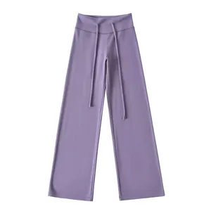 Full view of purple high-waisted wide-leg yoga pants with a comfortable drawstring waist.