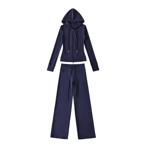 Dames trainingspak set met marineblauwe hoodie met rits en wijde trainingsbroek