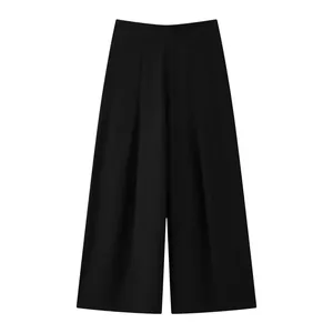 High-waist black wide-leg trousers with elegant drape and relaxed fit for stylish women