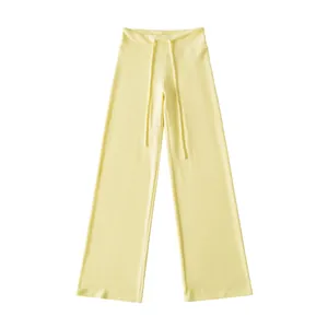 Pastel yellow wide-leg straight pants with an adjustable drawstring elastic waist