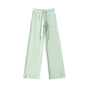 Muntgroene yoga-broek met hoge taille, wijde pijpen en een verstelbaar trekkoord in de taille
