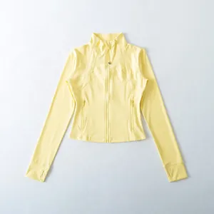 Giacca da yoga corta gialla slim fit da donna con chiusura lampo e fori per i pollici
