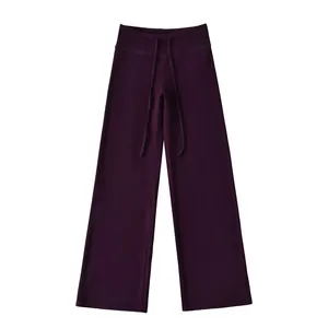 Detailed view of thermal de-velvet wide-leg yoga pants in deep purple with drawstring waist