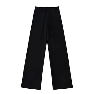 Flat lay view of black wide-leg straight yoga pants with adjustable drawstring waist.