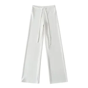 Comfortable white high-waisted wide-leg yoga pants with adjustable drawstring waist detail