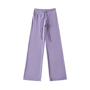 Casual lichtpaarse yoga-broek met wijde pijpen, hoge taille en trekkoord.