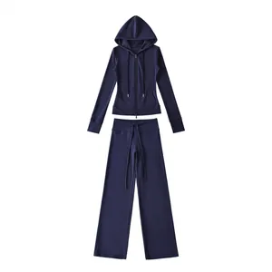 Marineblauwe tweedelige set met hoodie met rits en yoga-broek met wijde pijpen