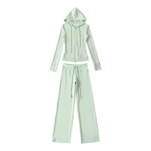 Tweeledige lichtgroene katoenen set met hoodie met rits en broek met wijde pijpen