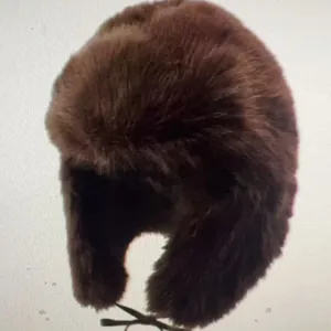 Premium cozy brown faux fur earflap hat for extreme winter warmth and outdoor style