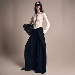 High-waisted wide-leg black trousers with elegant drape and front pleats
