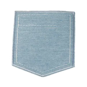 Light blue embroidered denim pocket patch featuring white decorative stitching detail