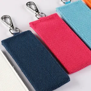 Collection of colorful canvas webbing keychains featuring durable metal swivel lobster clips