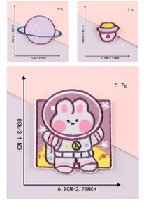 Set of space embroidered patches with astronaut rabbit, planet and spaceship designs.