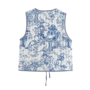 Detailed back view of a quilted cotton vest featuring blue and white Toile de Jouy animal patterns