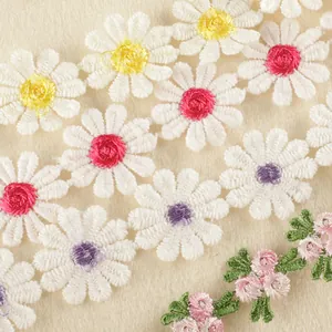 White embroidered daisy flower lace trim with colorful centers for DIY sewing crafts