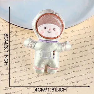Embroidered plush astronaut doll accessory showing 8cm height and 4cm width detail