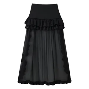Full view of black tiered ruffle skirt with sheer mesh bottom for elegant summer look