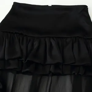 Elegant black multi-layer ruffled high-low skirt with satin layers and sheer chiffon trail