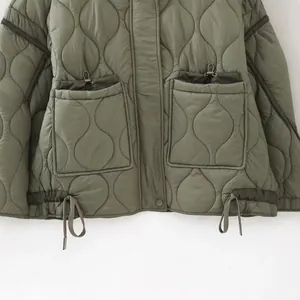 Olive green quilted puffer jacket for women with unique wave stitching and drawstring