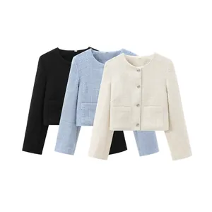 Set of three tweed cropped jackets in black, blue, and beige with round neck design.