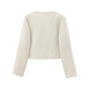 Detailed back view of a chic cream tweed short jacket with elegant textured weave fabric