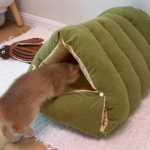 Warm green corduroy tunnel cat bed with soft plush lining and zipper detail for winter