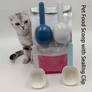 Multi-purpose pet food measuring scoop with integrated bag sealing clip made of ABS