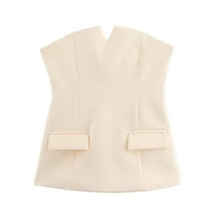 Detailed front view of elegant cream sleeveless tube top featuring a V-neck cutout