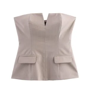Macro view of pinstriped strapless bustier top featuring V-notch and flap pockets