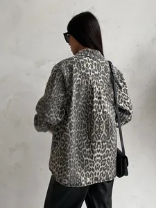 Fashionable vintage leopard print denim jacket with a relaxed oversized fit shown on model