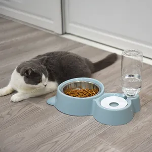 Juego de comedero y bebedero automático para mascotas con cuenco de acero y botella de agua.