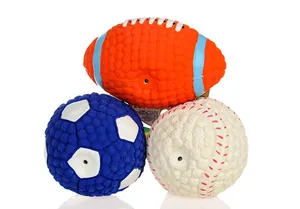 Detailed view of three textured squeaky dog balls in football, soccer, and baseball shapes