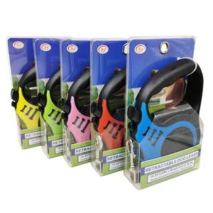 Multiple colors of retractable dog leashes with cute bone prints in retail packaging