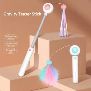 Retractable interactive cat teaser wand with replaceable feather and ribbon attachment heads