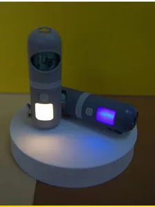 Detailweergave van de draagbare capsule hondenpoepzakjesdispenser met tweekleurig LED.