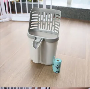 Integrated cat litter scoop set with storage bin and a roll of blue pet waste bags