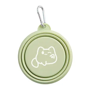 Portable green collapsible silicone pet bowl featuring a cute cat print and a metal carabiner