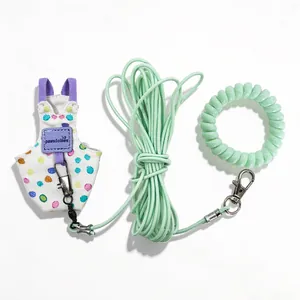Polka dot bird harness vest with long elastic flight leash and green wrist strap set
