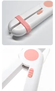 Nahaufnahme des professionellen weißen und rosa Petgravity LED-Tiernagelknipsers