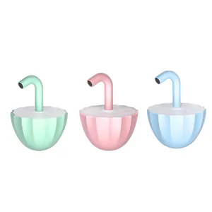 Set of automatic tumbler cat toys with laser pointers in pastel pink, blue, and green