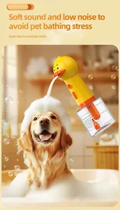Close-up of yellow duck pet foamer spraying rich bubbles on a dog during bath