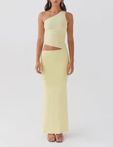 Elegant pale yellow one-shoulder knit top and long skirt set for women slim fit