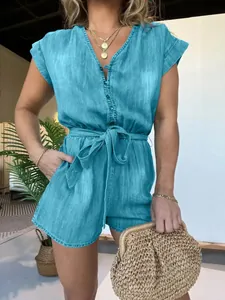 Full view detail of a chic women's short sleeve teal blue Tencel denim romper jumpsuit