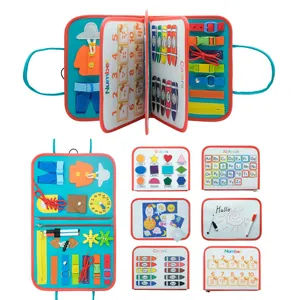 Detail view of a felt busy board featuring alphabet, numbers, shapes, and color pages.