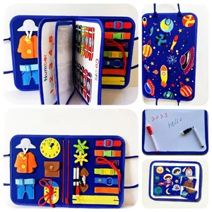 Detailed view of kids' felt busy board featuring clock, colors, and zipper activities